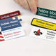 Illustration for article titled PLASTIC NAME BADGES